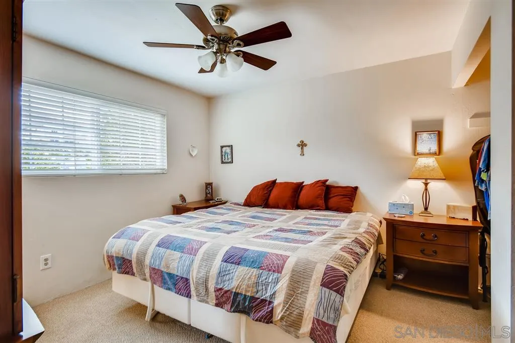 9809 Medina Drive Santee, CA 92071 - Photo 13 of 22 a bedroom with a bed and dresser