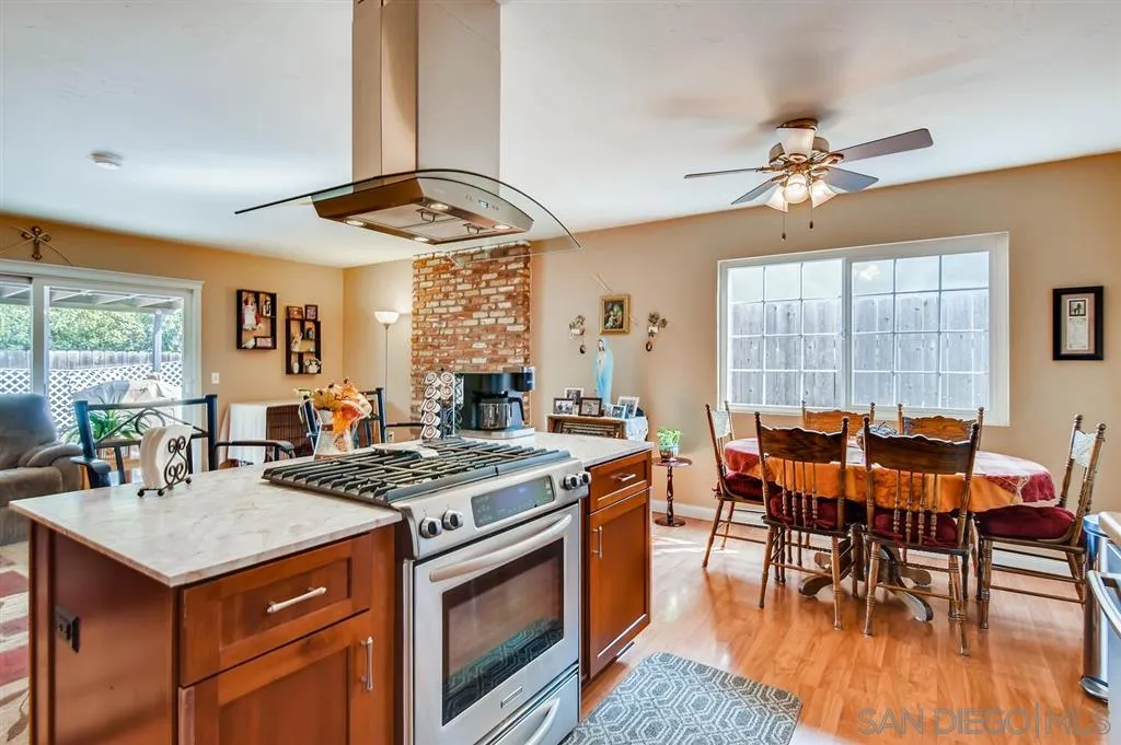 9809 Medina Drive Santee, CA 92071 - Photo 8 of 22 a view of a dining room with furniture window and outside view
