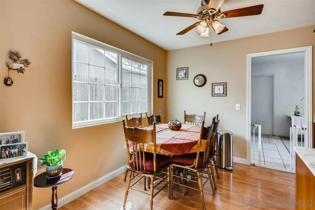 9809 Medina Drive Santee, CA 92071 - Photo 10 of 22 a view of a dining room with furniture and wooden floor