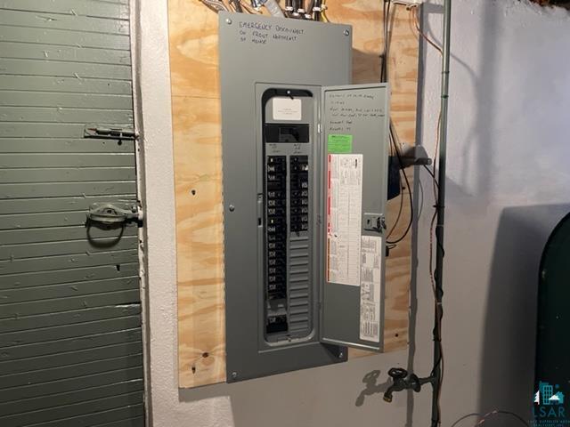 32 West Shagawa Road Ely, MN 55731 - Photo 23 of 26 Utility room featuring electric panel