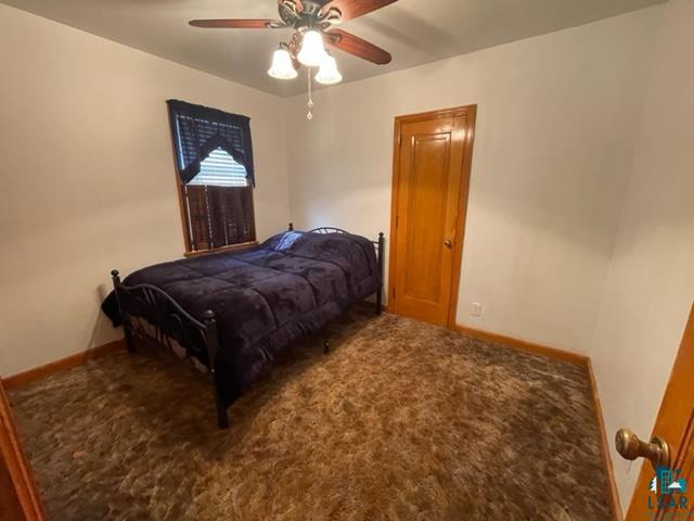 32 West Shagawa Road Ely, MN 55731 - Photo 10 of 26 Carpeted bedroom with ceiling fan
