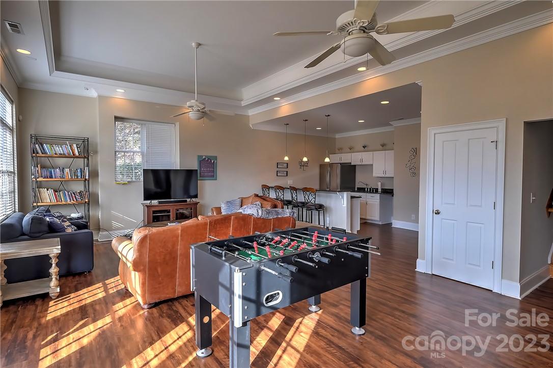 9543 Island Point Road Sherrills Ford, NC 28673 - Photo 16 of 31 a outdoor space with furniture a flat screen tv and kitchen view