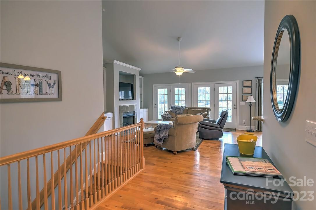 9543 Island Point Road Sherrills Ford, NC 28673 - Photo 2 of 31 a living room with furniture and a floor to ceiling window