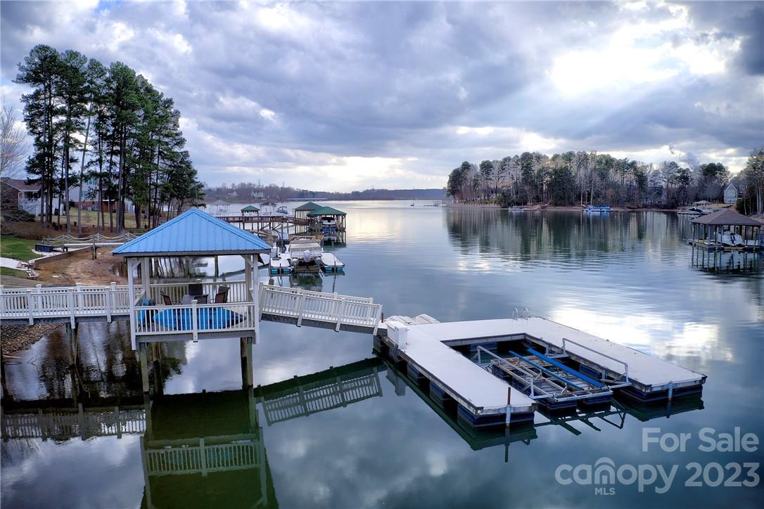 9543 Island Point Road Sherrills Ford, NC 28673 - Photo 22 of 31 a view of a lake with outside seating area