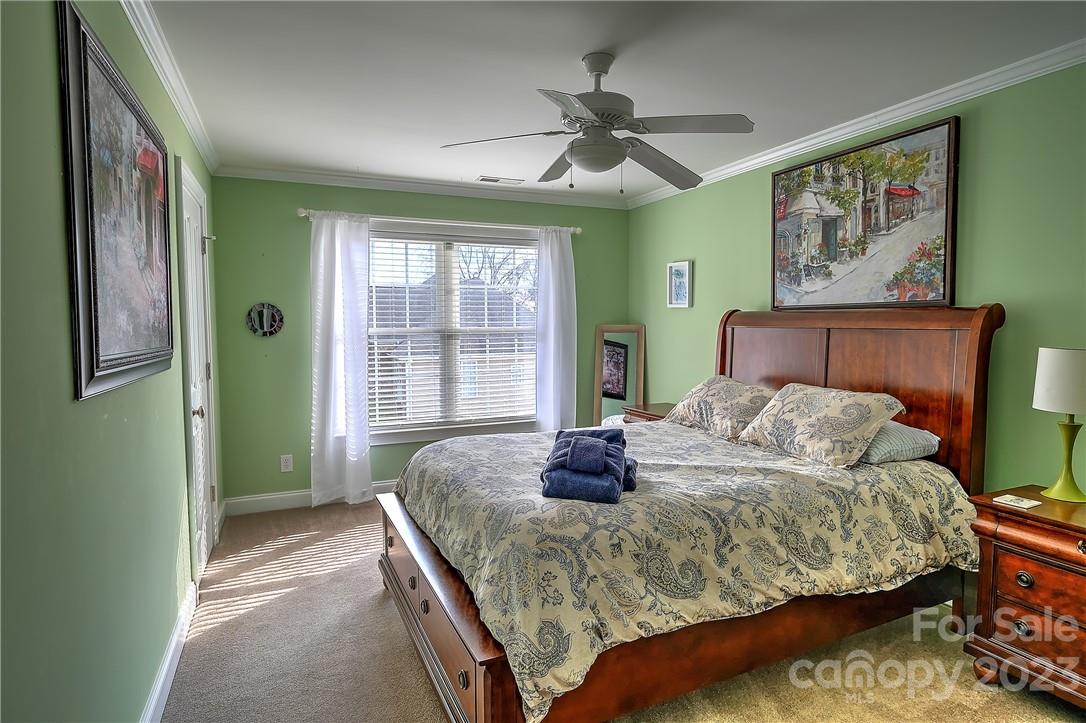 9543 Island Point Road Sherrills Ford, NC 28673 - Photo 25 of 31 a bedroom with a bed and a window