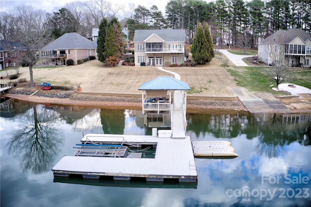 9543 Island Point Road Sherrills Ford, NC 28673 - Photo 27 of 31 a view of house with yard and sitting area