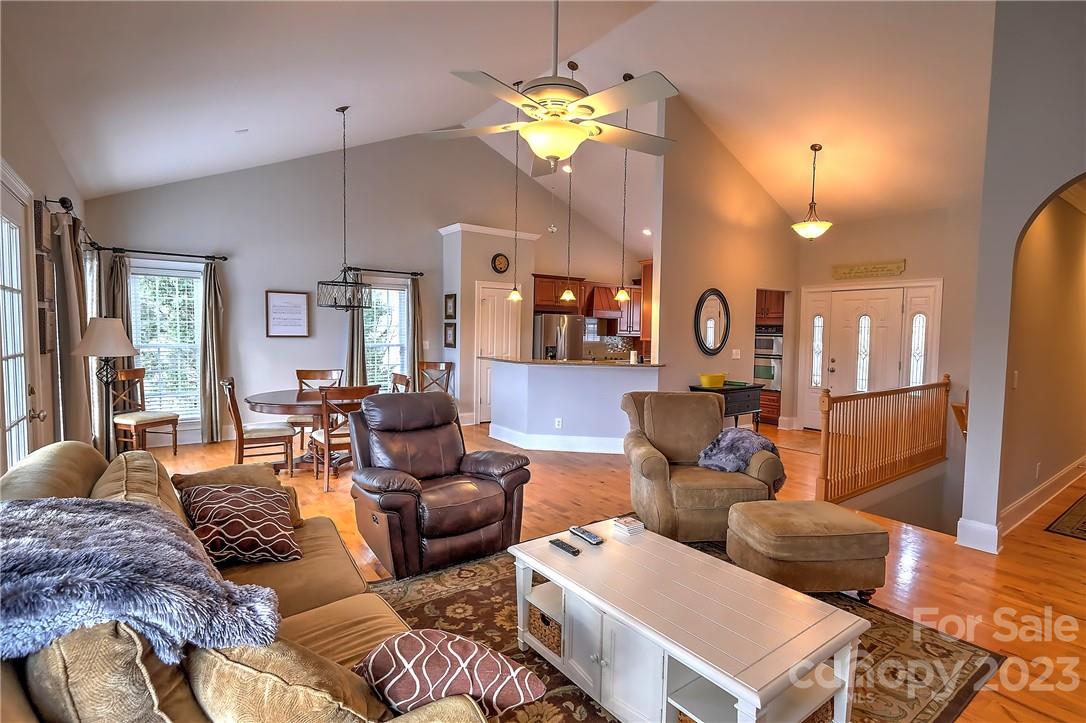 9543 Island Point Road Sherrills Ford, NC 28673 - Photo 5 of 31 a living room with furniture chandelier and a chandelier