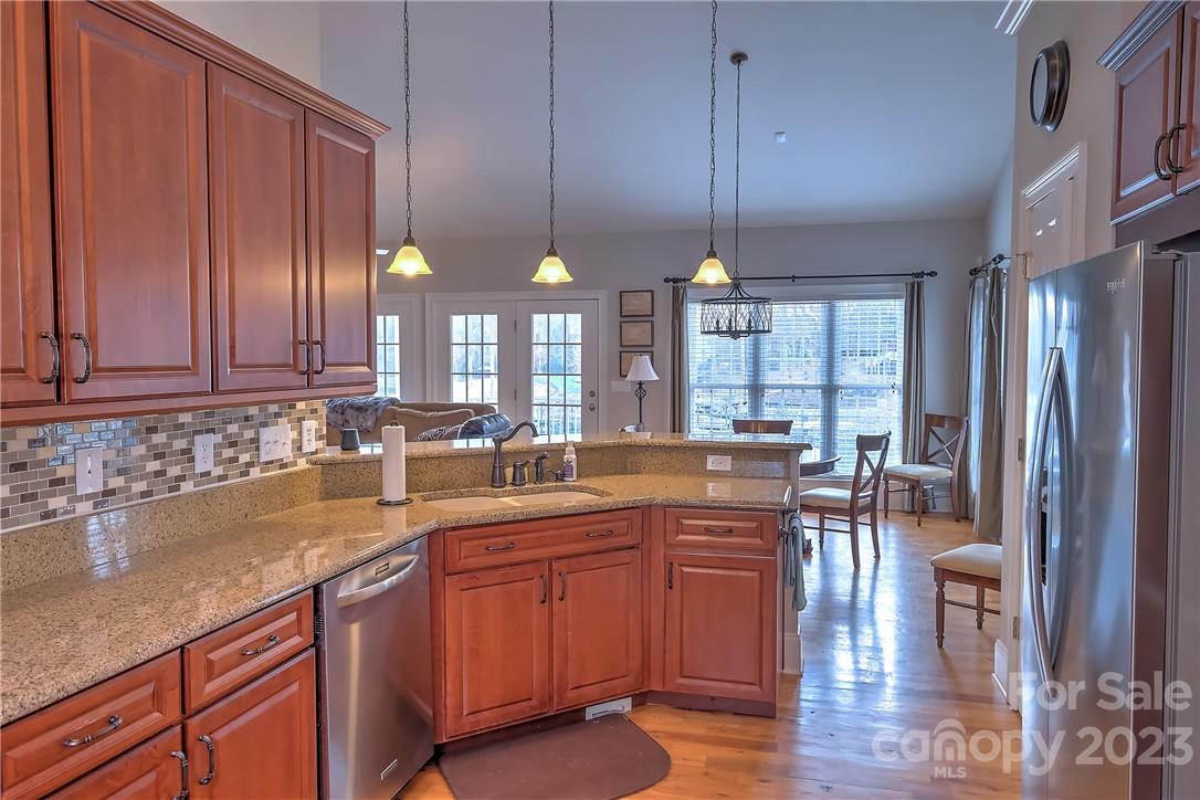 9543 Island Point Road Sherrills Ford, NC 28673 - Photo 8 of 31 a kitchen with lots of counter top space and dining table