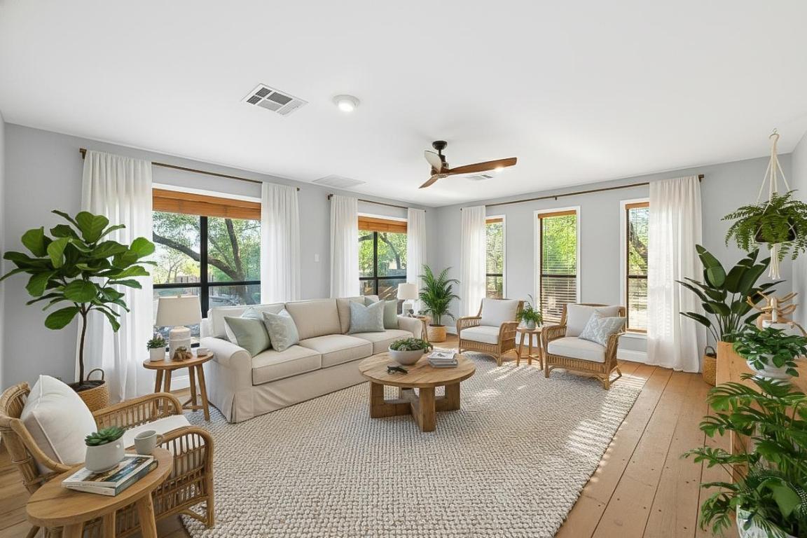 7804 Phoenix Pass Austin, TX 78737 - Photo 3 of 34 Living room with wood-type flooring and a ceiling fan