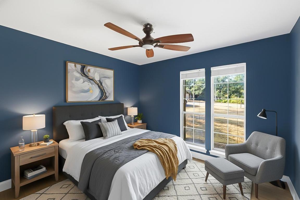 7804 Phoenix Pass Austin, TX 78737 - Photo 9 of 34 Bedroom with light wood-style flooring and a ceiling fan