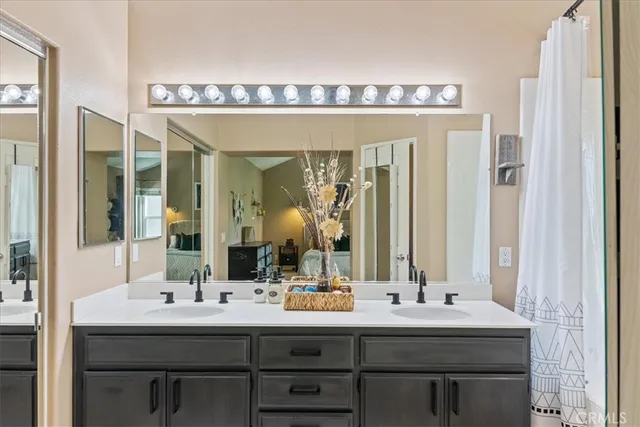 a view of a hallway with wooden shelves