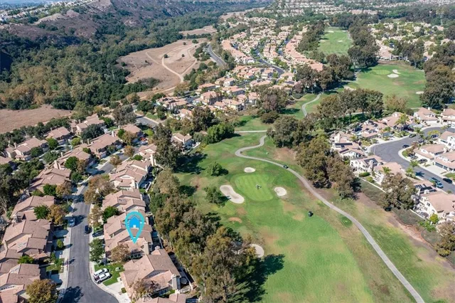an aerial view of residential house and lake view