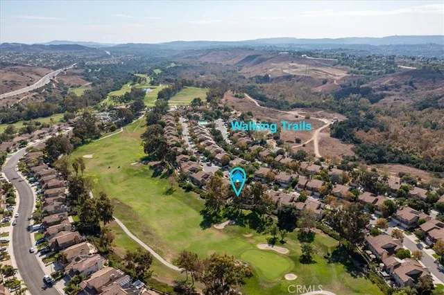 a view of residential houses with outdoor space