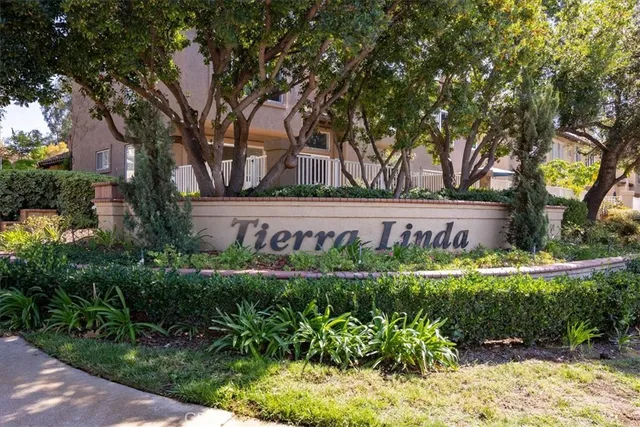 a view of a swimming pool with a lounge chair