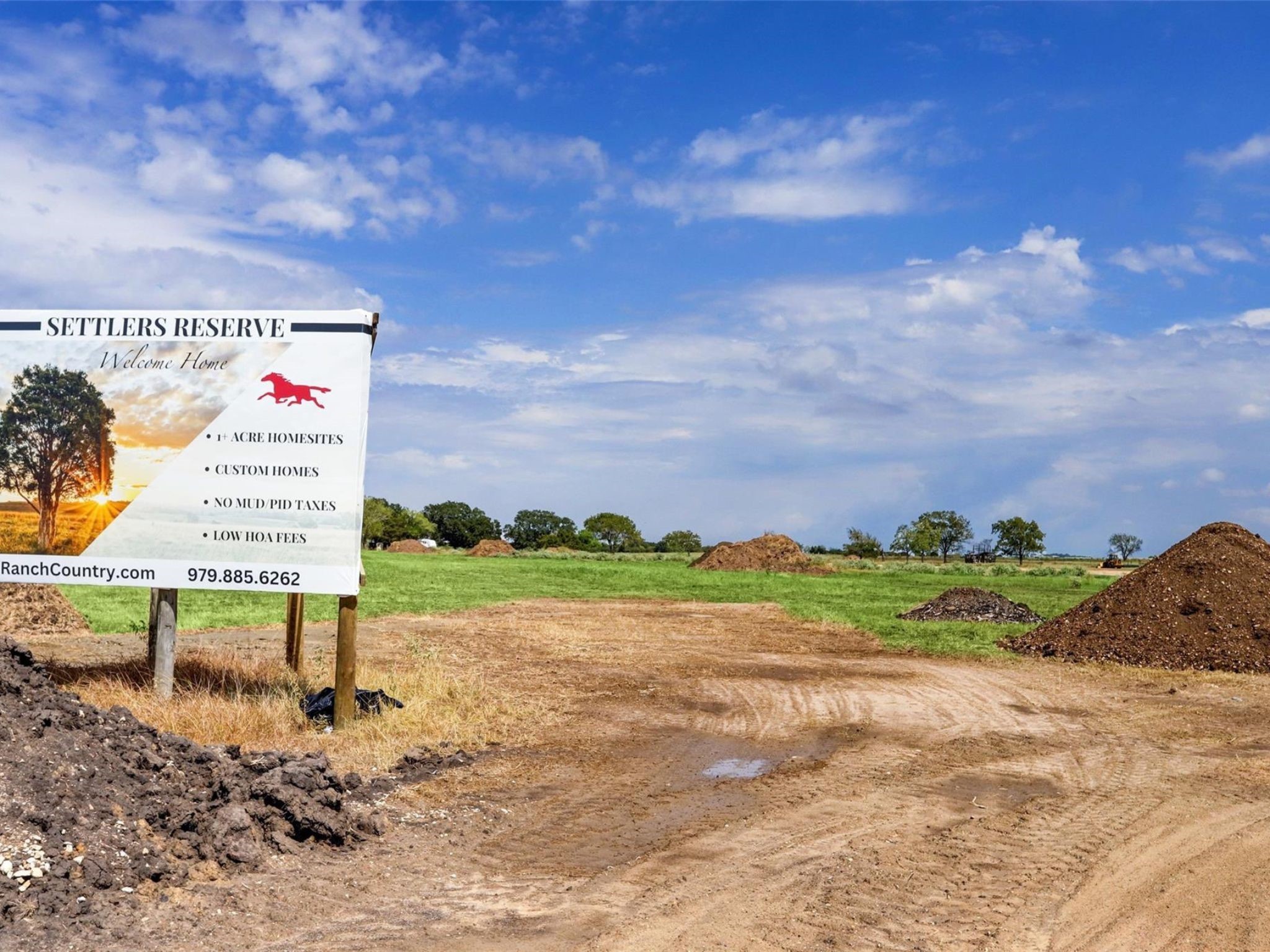 Lot 14 Rolling Hill Drive Cat Spring, TX 78933 - Photo 3 of 20 a sign on the side of the road