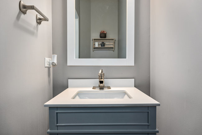 2602 Lundquist Drive Aurora, IL 60503 - Photo 22 of 30 a bathroom with a sink and a mirror