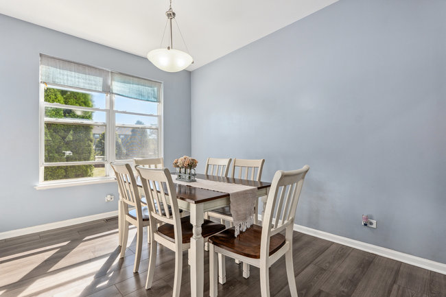 2602 Lundquist Drive Aurora, IL 60503 - Photo 8 of 30 a view of a dining room with furniture window and outside view