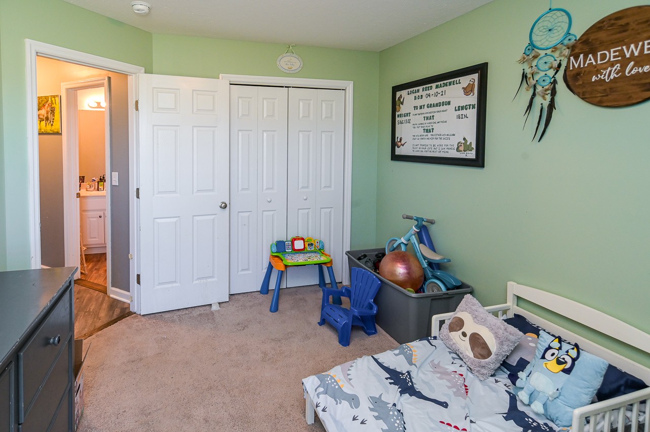 280 Flintville School Road Elora, TN 37328 - Photo 25 of 40 a bedroom with two beds and painted walls