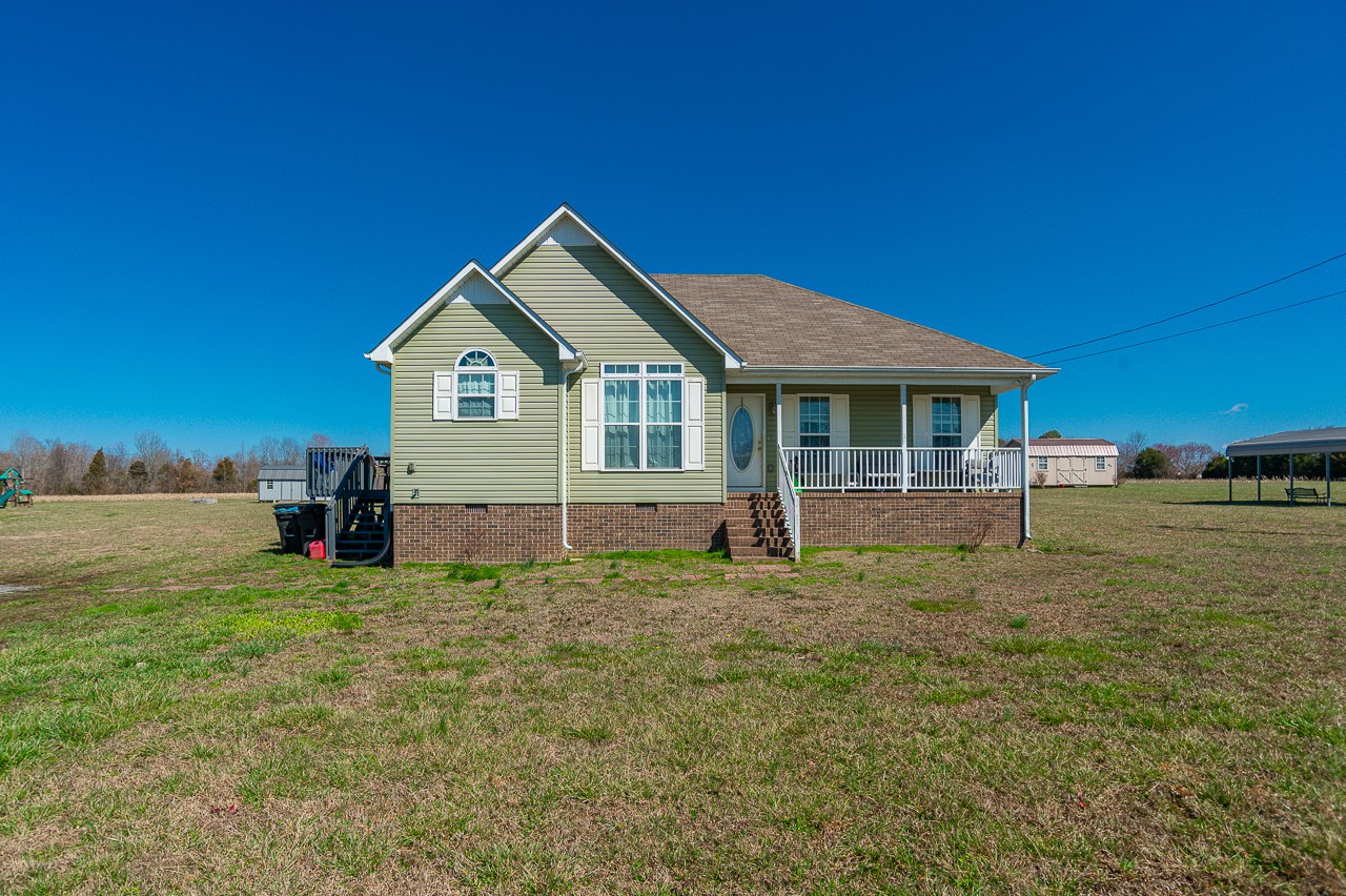 280 Flintville School Road Elora, TN 37328 - Photo 3 of 40 a view of a house with a yard and deck