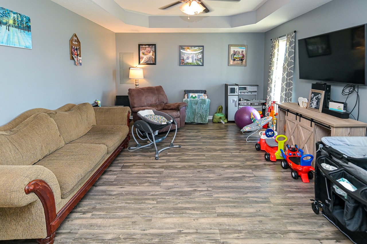 280 Flintville School Road Elora, TN 37328 - Photo 7 of 40 a living room with furniture and a flat screen tv