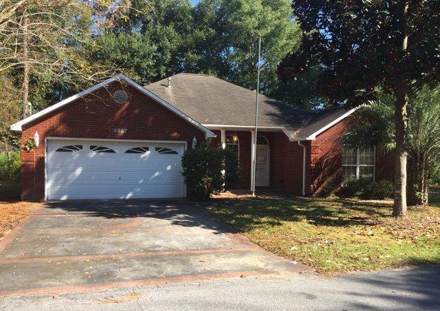 4587 Top Flight Drive Crestview, FL 32539 - Photo 1 of 16 a view of a house with a yard