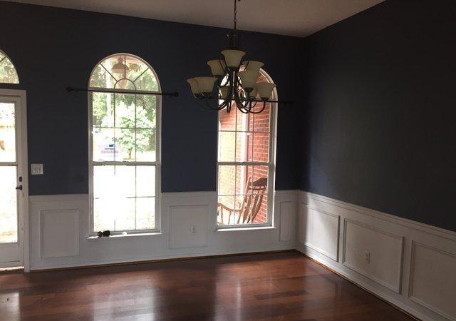 4587 Top Flight Drive Crestview, FL 32539 - Photo 3 of 16 a view of empty room with wooden floor and fan