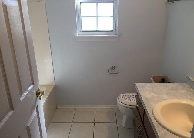 4587 Top Flight Drive Crestview, FL 32539 - Photo 10 of 16 a bathroom with a sink and toilet