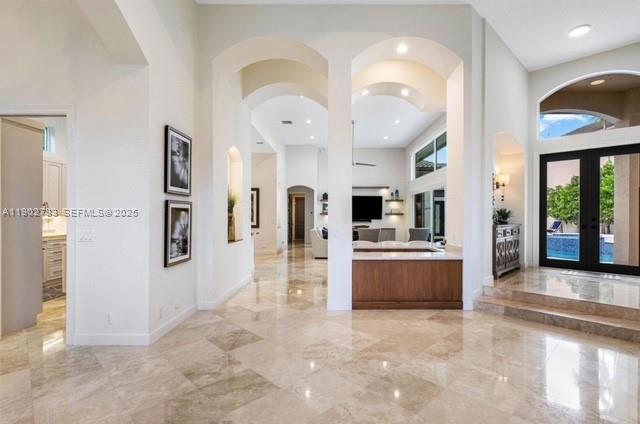 2393 Northwest 49th Lane Boca Raton, FL 33431 - Photo 12 of 21 a view of a kitchen with refrigerator and windows