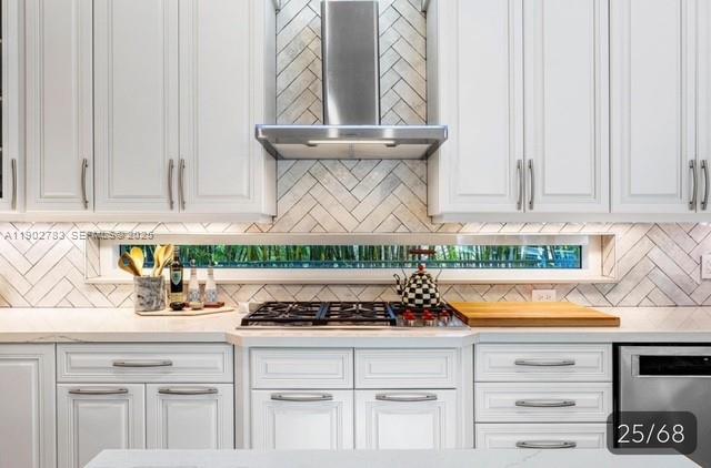 2393 Northwest 49th Lane Boca Raton, FL 33431 - Photo 9 of 21 a kitchen with stainless steel appliances granite countertop a sink and a stove