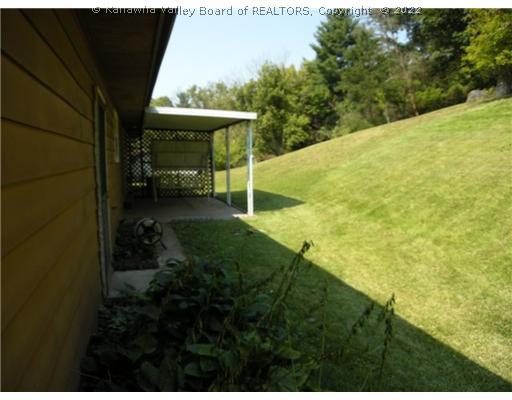 150 Kens Lake Estates Road Winfield, WV 25213 - Photo 7 of 8 Yard/Garden. Great covered back porch!
