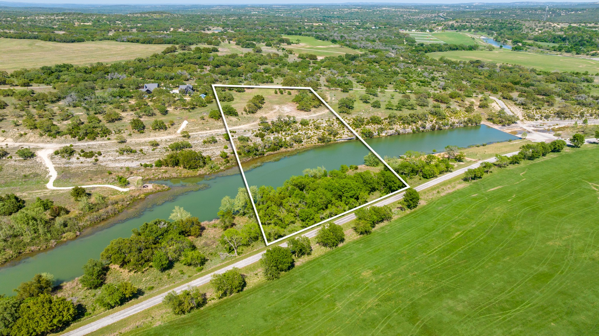 Lot 2 Byrd Ranch Road Johnson City, TX 78636 - Photo 40 of 40 Aerial view featuring a water view