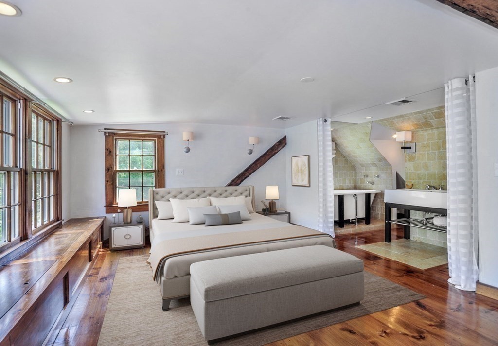 208 Prospect Street Hingham, MA 02043 - Photo 13 of 34 a bedroom with a bed couch and a window