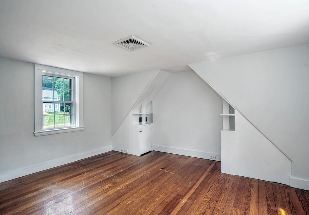 208 Prospect Street Hingham, MA 02043 - Photo 15 of 34 a view of empty room with wooden floor and fan