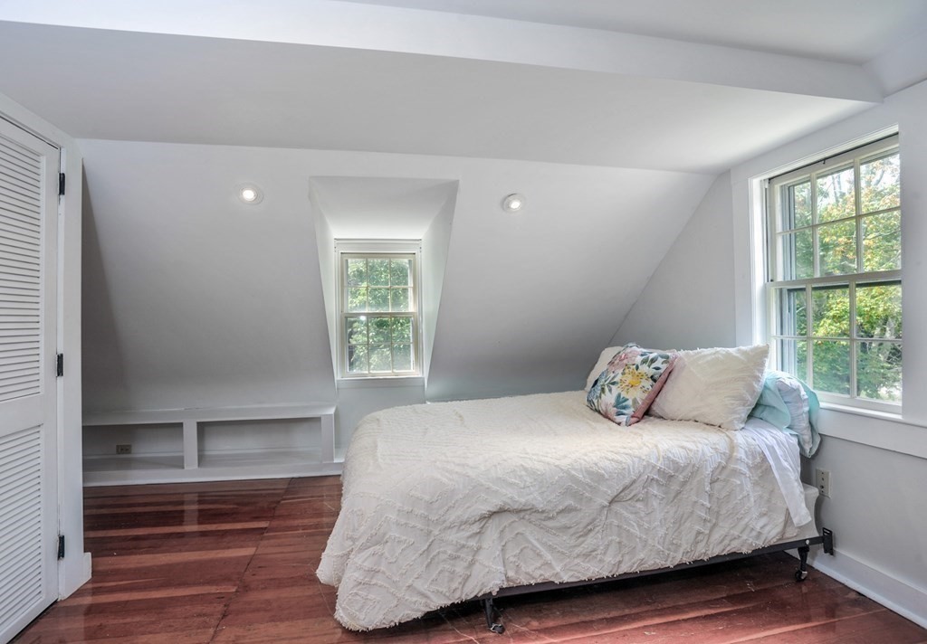 208 Prospect Street Hingham, MA 02043 - Photo 18 of 34 a bedroom with a bed and window