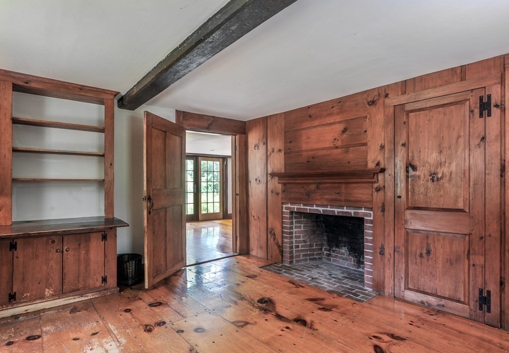 208 Prospect Street Hingham, MA 02043 - Photo 20 of 34 a living room with furniture and a fireplace