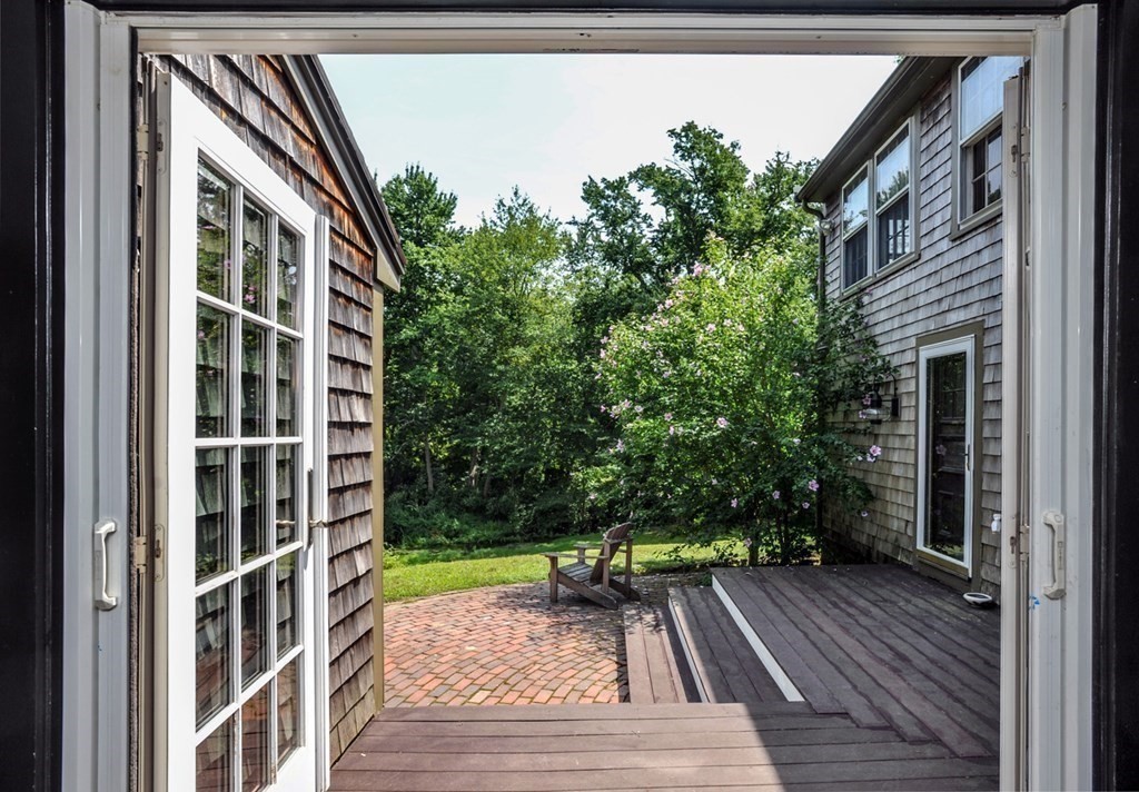 208 Prospect Street Hingham, MA 02043 - Photo 34 of 34 a view of balcony with wooden floor and fence