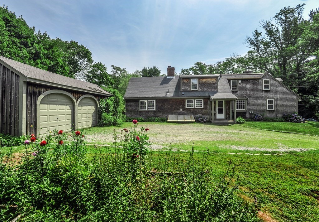 208 Prospect Street Hingham, MA 02043 - Photo 6 of 34 a front view of a house with garden