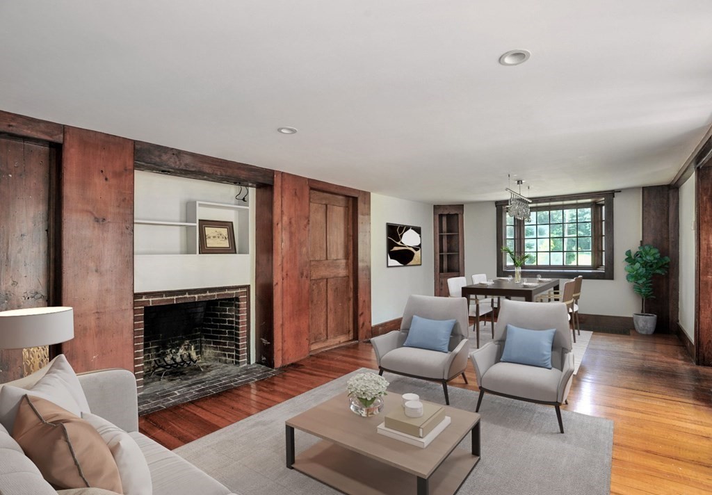 208 Prospect Street Hingham, MA 02043 - Photo 7 of 34 a living room with furniture and a fireplace