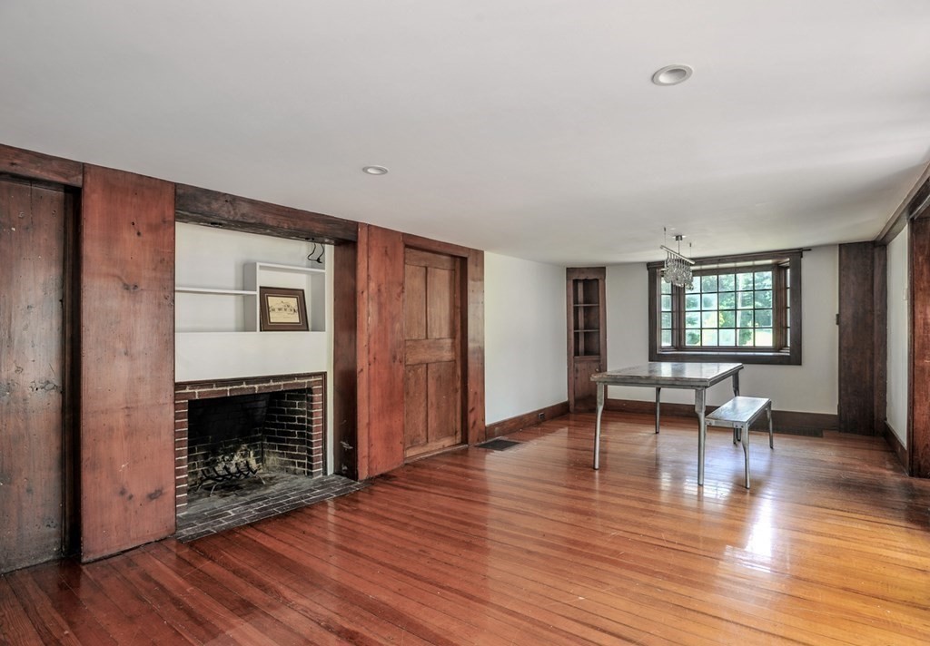 208 Prospect Street Hingham, MA 02043 - Photo 8 of 34 a view of a livingroom with furniture and a fireplace