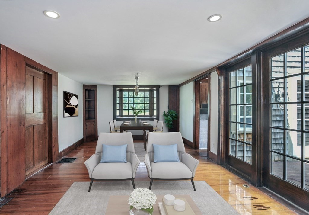 208 Prospect Street Hingham, MA 02043 - Photo 9 of 34 a living room with furniture and a large window