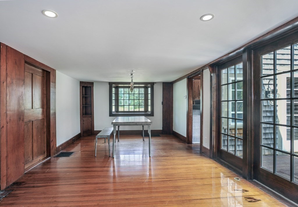 208 Prospect Street Hingham, MA 02043 - Photo 10 of 34 wooden floor in an empty room with a window