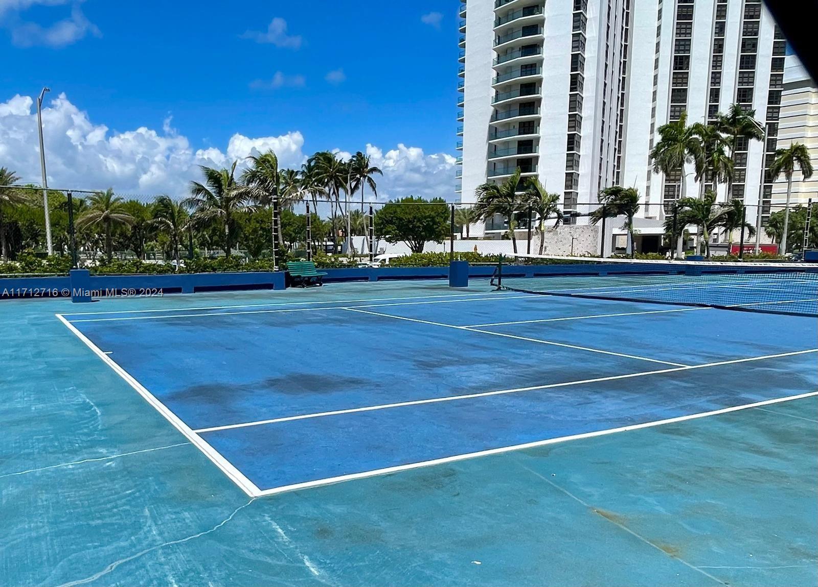 5445 Collins Avenue, Unit TS7 Miami Beach, FL 33140 - Photo 18 of 24 a view of a tennis court