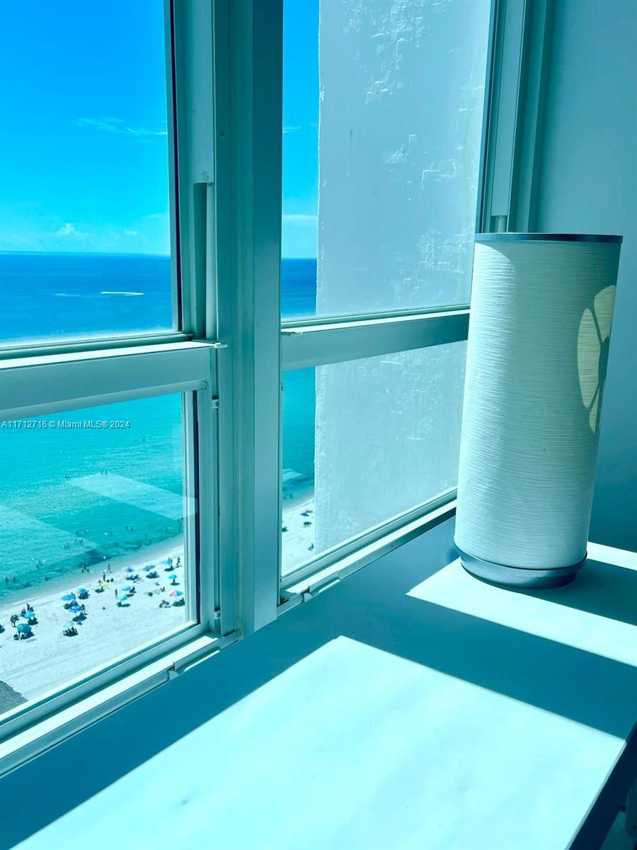 5445 Collins Avenue, Unit TS7 Miami Beach, FL 33140 - Photo 5 of 24 a view of an entryway with a small yard