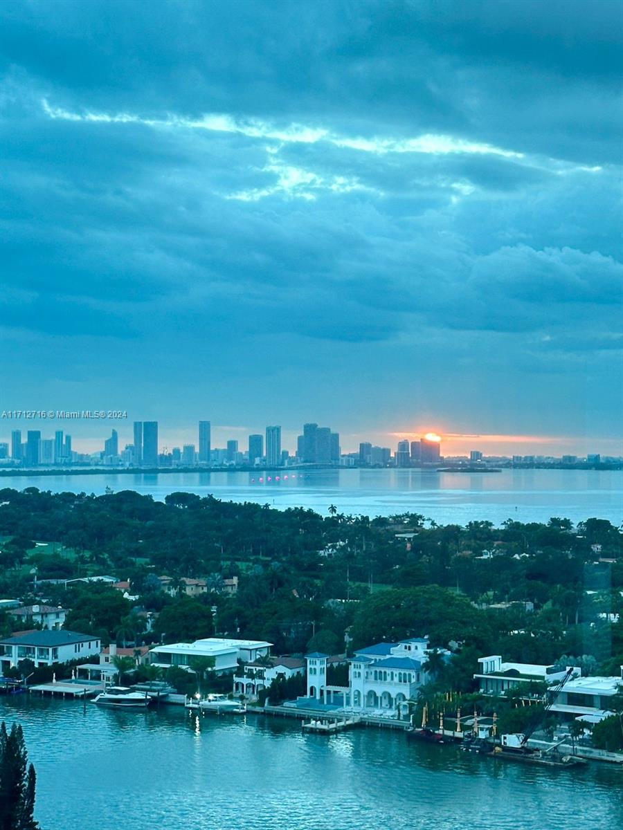 5445 Collins Avenue, Unit TS7 Miami Beach, FL 33140 - Photo 7 of 24 a view of a city with lots of residential buildings lake and ocean view