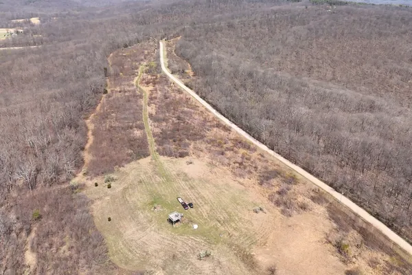 a view of backyard with green space