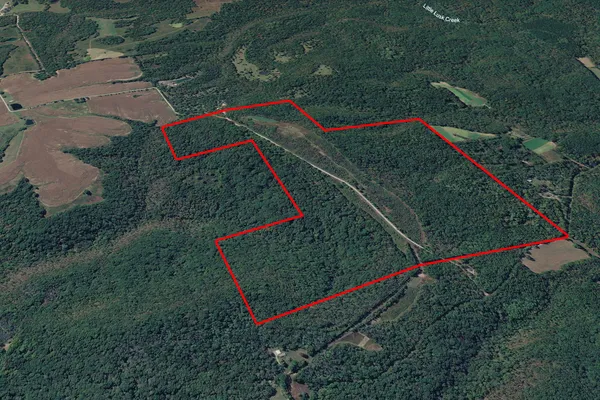 swimming pool with an outdoor space and seating area