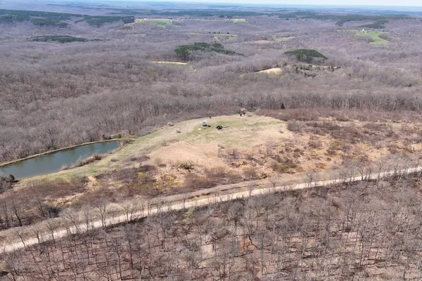 a view of wooden floor and fence