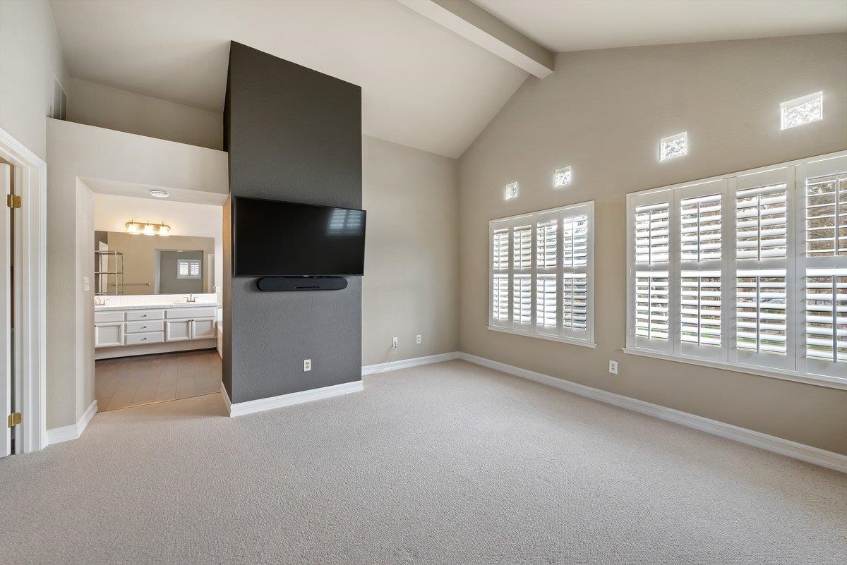 6206 Lakeview Circle San Ramon, CA 94582 - Photo 36 of 57 a view of an empty room with a window and a kitchen