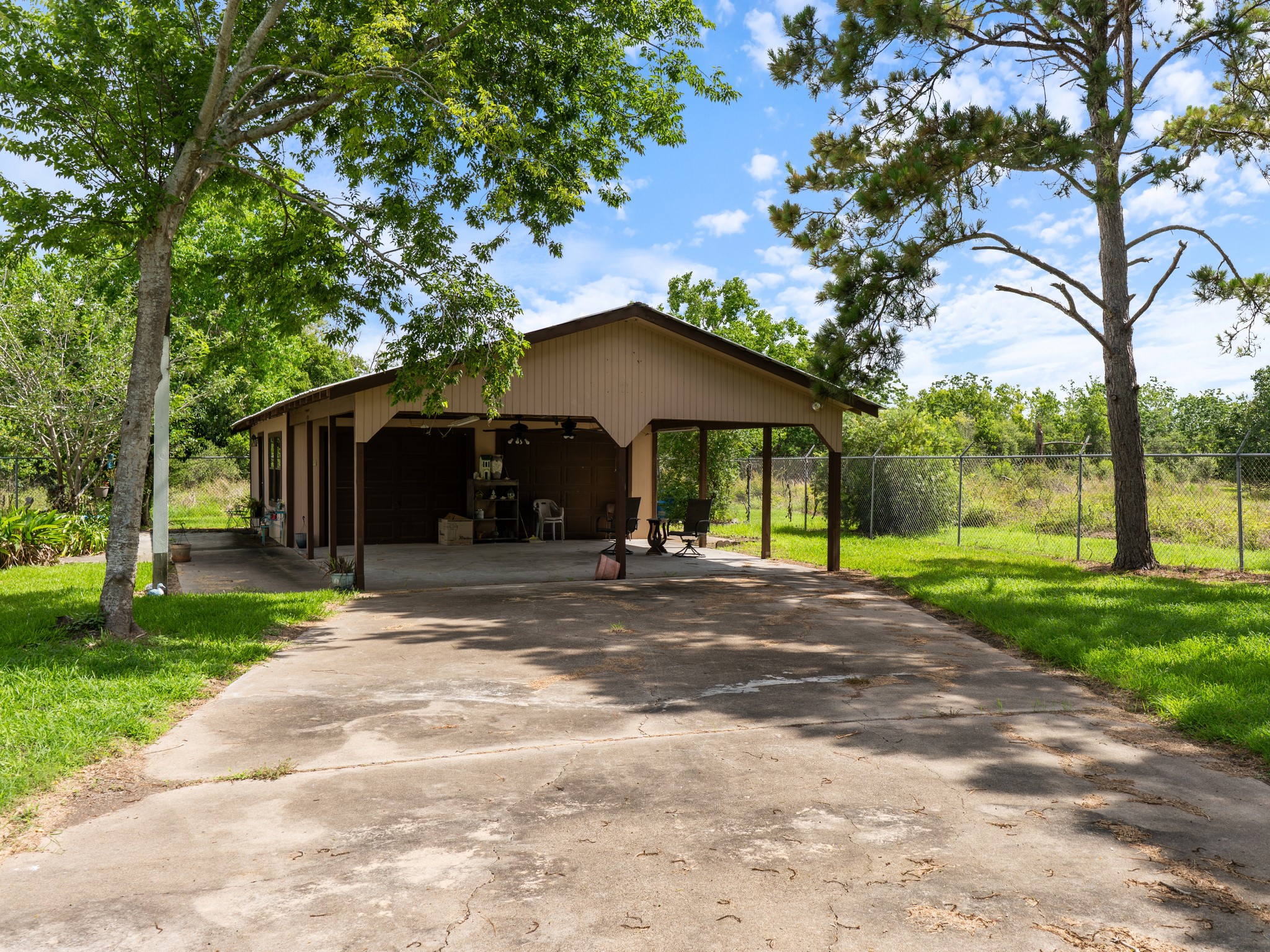 182 Smith Road Palacios, TX 77465 - Photo 21 of 23 a view of a house with a yard and tree s