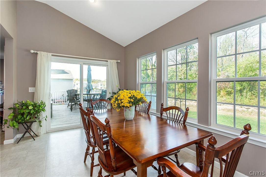 9 Naylor Circle Van Buren, NY 13027 - Photo 13 of 41 Dining area: View to the deck and backyard.